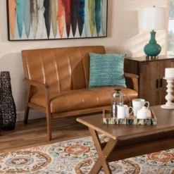 Nikko Mid-Century Faux Leather Upholstered Wood Loveseat Walnut/Brown - Baxton Studio 14 Nikko Mid-Century Faux Leather Upholstered Wood Loveseat Walnut/Brown - Baxton Studio -Baxton Studio GUEST d1496ae9 9e7b 4c99 a39c b224c1b080f8